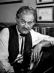 Image of Milburn Stone as Doc Adams on Gunsmoke By CBS Television (eBay item photo front photo back) [Public domain], via Wikimedia Commons
